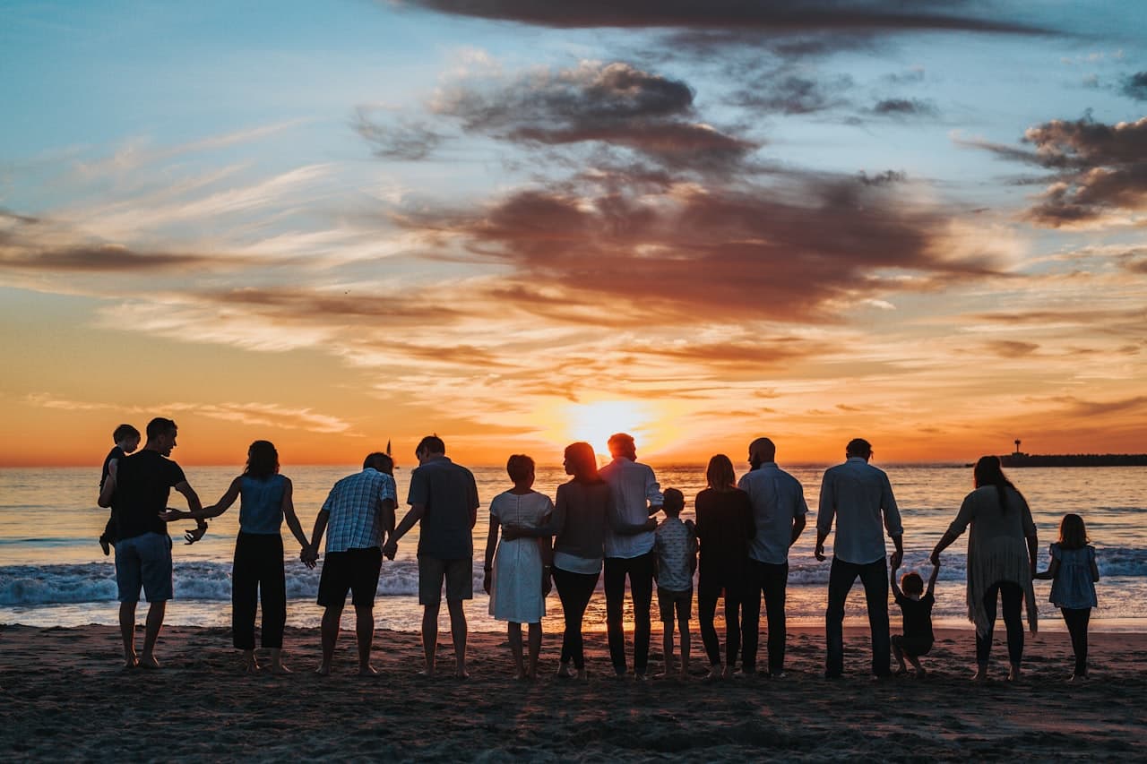 Family silhouette at sunset
